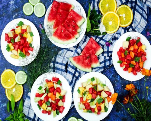 Bowl of diced papaya with lime